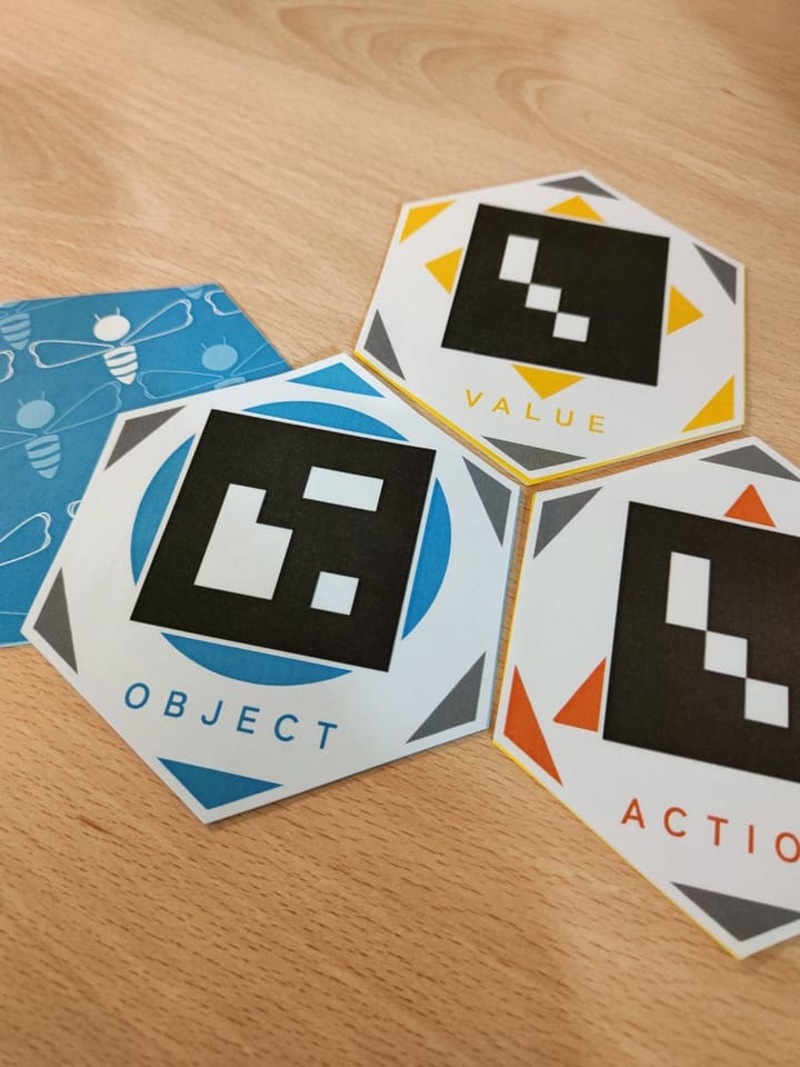 Hachi cards with AR markers labelled Object and Action.